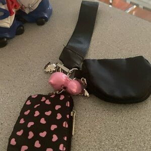 Two wristlet purses